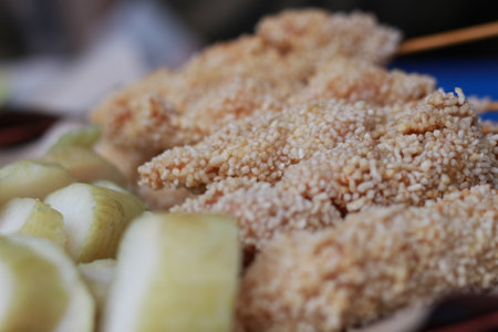 photo of chicken satay breaded and served with red chili sauce. Indonesian food called Sate Taichan. Food concept photo.の写真素材