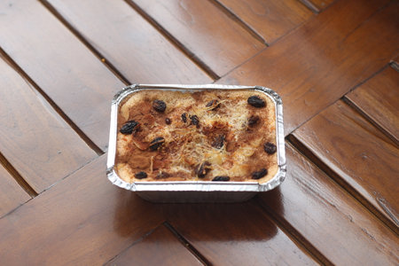 a close up of klapertart which is a typical food from Manado, Indonesia. Made from young coconut meat, sugar, flour, almonds, milk, butter, eggs, cinnamon and grated cheese. Indonesian traditional food photo concept.の写真素材