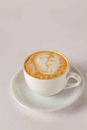 Cup of coffee latte art on white background, stock photoの写真素材