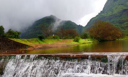 Hills and small waterfalls of Tamhini Ghat near Pune Maharashtra during monsoons. Tamhini a favourite monsoon holiday destination for people around Mumbai and Pune.の写真素材
