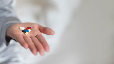 Close up hand holding medicine