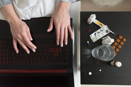 Close up hands typing on keyboard