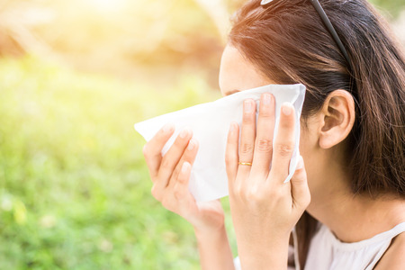 the women clean sweat on her face.の写真素材