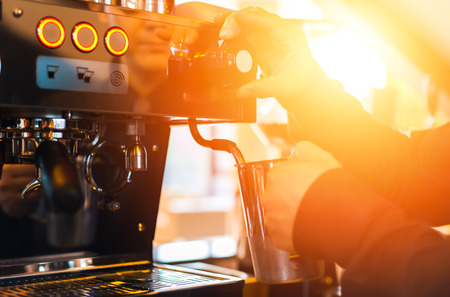 The barista make coffee in shop.の写真素材