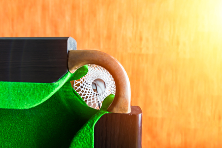 the hold in the corner in the table snooker.の写真素材