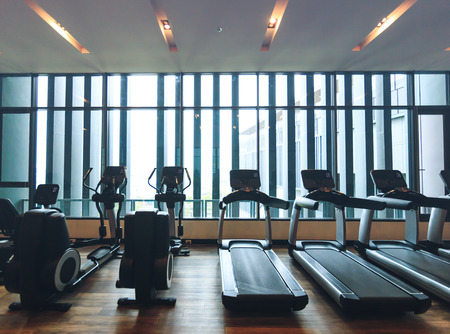 running machine in the room near the windows.の写真素材