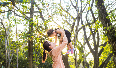 Chonburi, Thailand - January 18, 2018: Mother and child in the forest.の写真素材