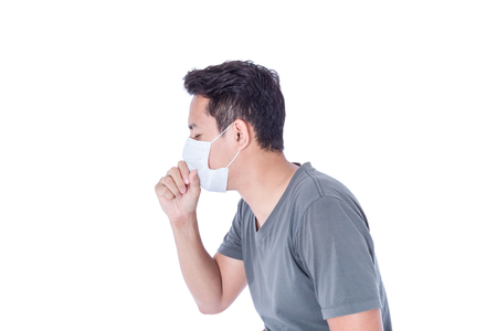A sick man wear hygienic mask and cough.の写真素材