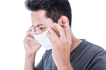 A sick man wear hygienic mask.の写真素材