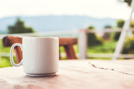 A cup of coffee on the table .の写真素材