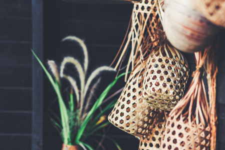 Wicker round bamboo basket hang on the wall.の写真素材
