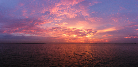 sea and cloud in golden hour.の写真素材