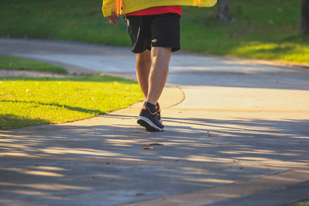 Sporty man jogging or exercise in national park.Sport concept.の写真素材