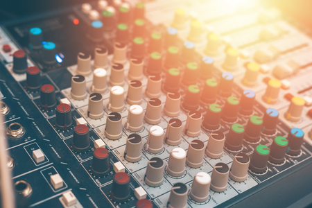 Sound recording studio mixing desk. Music mixer control panel. Closeup.の写真素材