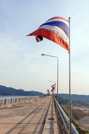 Thai flag of waving  with blue sky background.の写真素材