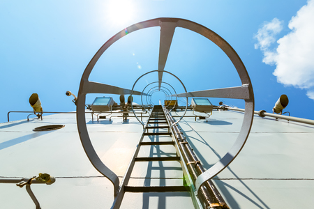 stairway to top of battle ship and blue sky in midday.の写真素材