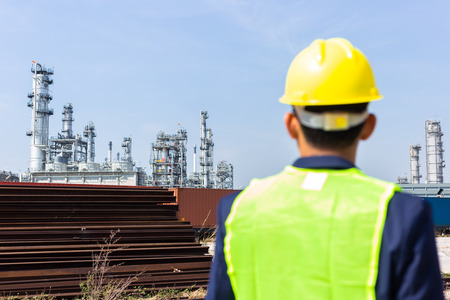 Construction Worker Planning Contractor Checking  at site gas, oil, energy and factory construction.の写真素材