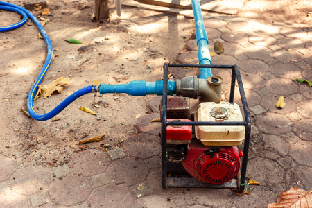 Water pump on the ground in the park.の写真素材