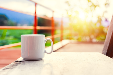 A cup of coffee on the table in the morning.の写真素材