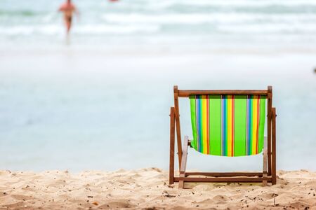 beach chair on the beach near the sea water.の写真素材