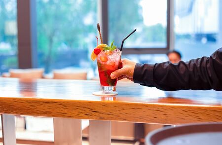 lemon, ice, tube and mint in mock tail on the table.の写真素材