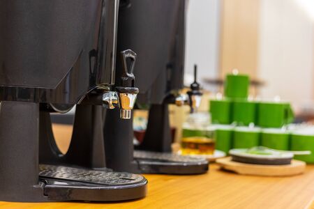 the water cooler are on the table at the hotel.の写真素材