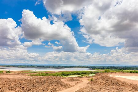 Soil prepare for building under blue sky and cloud.の写真素材