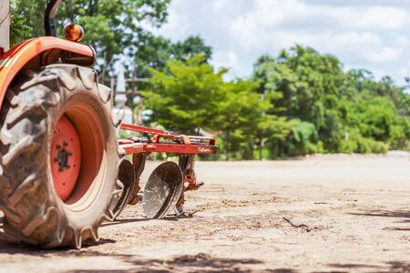 The tractor car plowed soil.の写真素材