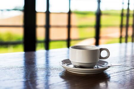A cup of coffee on the table.の写真素材