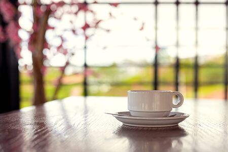 A cup of coffee on the table.の写真素材