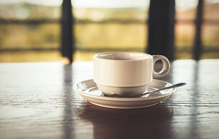 A cup of coffee on the table.の写真素材