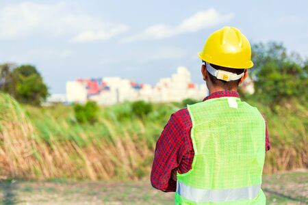 Construction Worker Planning Contractor Checking  at site gas, oil, energy and factory construction.の写真素材
