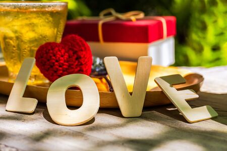 Word love on the table. Love, Gift box Valentine concept.の写真素材