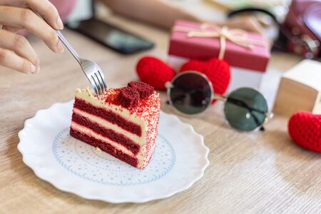 eating Red Velvet strawberry cheese cake.の写真素材