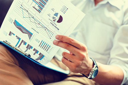 Businessman check calculate data. document graph chart and report marketing. Business office...
