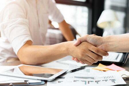 Business people shaking hands, finishing after meetingの写真素材