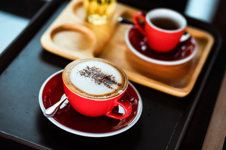 Businesswomen and foreman shake hands together. Engineer and manager teamwork and checking at site construction .の写真素材