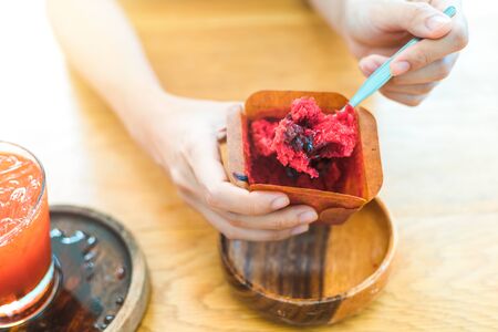 women and muffin strawberry jam.の写真素材