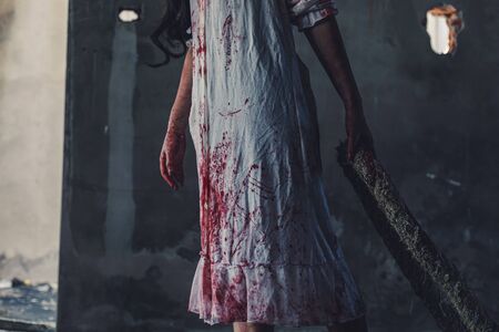 Ghost women wear white dress stain blood. Halloween conceptの写真素材
