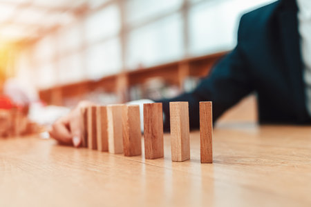 hand stacking wooden blocks. Business development and growth concept