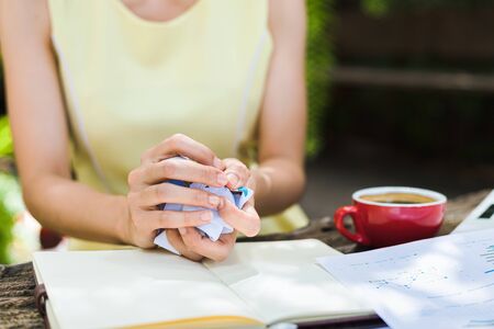 A businesswomen Crumpled up papers by hand. Fail, bad, no idea concept.の写真素材