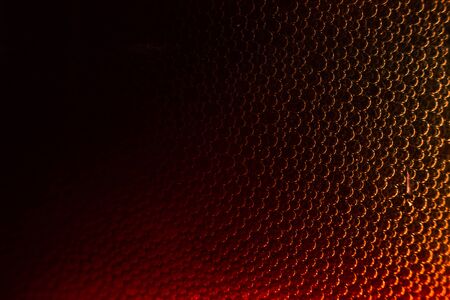 Drops of water on red metallic surface. Macro photo ,close up drop water on red backgroundの写真素材
