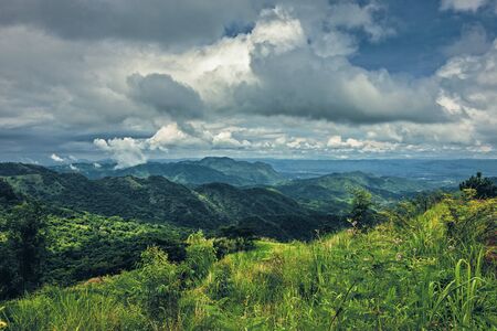 green hill mountain under beautiful clouds.の写真素材