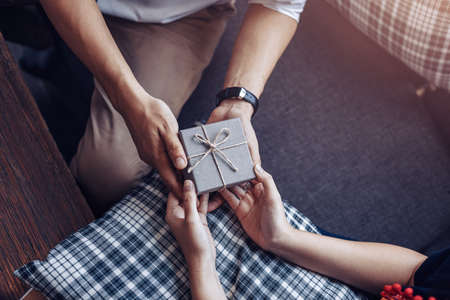 Couple surprise gift box together.の写真素材