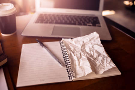 crumpled paper on table. Concept of no idea.の写真素材