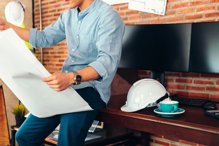 industry manager, engineer, businessman reading and checking blueprint, drawing  in the room....