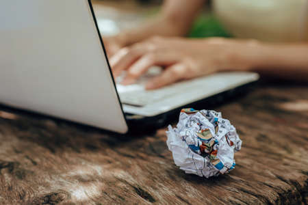 A Crumpled paper on the table. Fail, bad, no idea concept.の写真素材