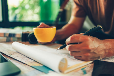 Tourist hold pen and planning vacation with calendar and map.Travel, holiday, vocation and new year concept.の写真素材