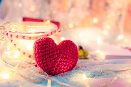 heart shape, Foam beads, feather and light decorative bokeh on blue cloth. Love, Valentine and...