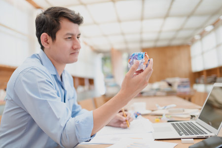 Angry business people crumple business data documents. Business fail, serious or angry concept.